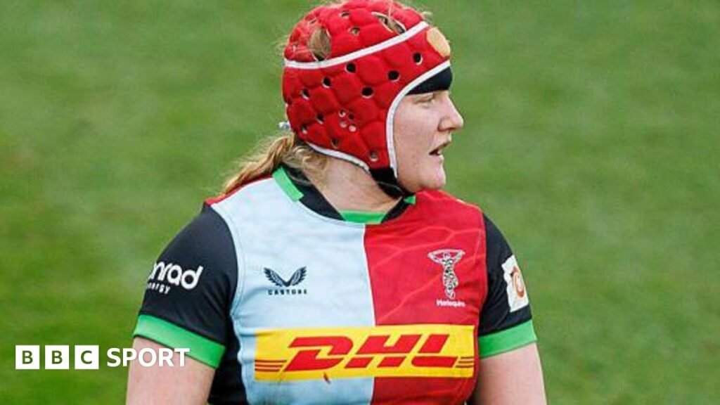 Aoife Wafer, ball in hand, drives through a couple of Exeter Chiefs challenges