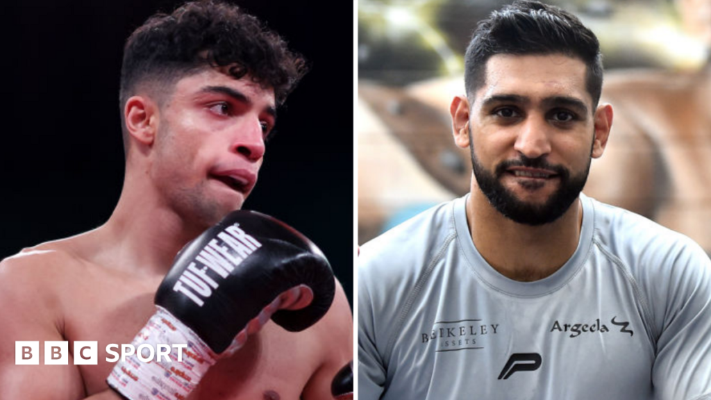 Azim vs Claggett: Abdul Khan – ‘cousin Amir opened doors, now it’s my time’ Abdul Khan (left) holds up his hand is wearing a black boxing glove and Amir Khan (right) is wearing a grey t-shirt