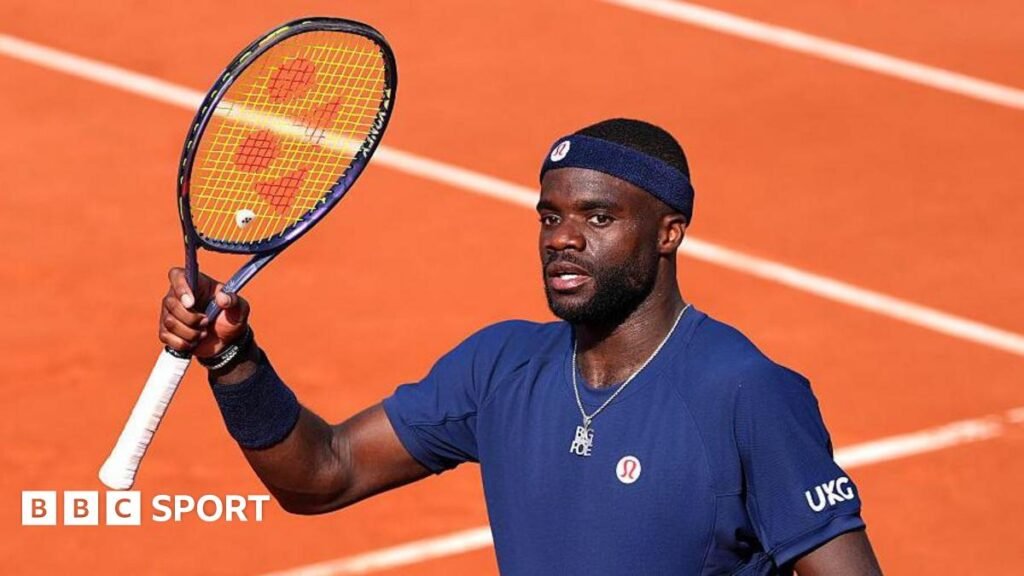 French Open 2026 results: Frances Tiafoe gets racquet back after Instagram plea Frances Tiafoe raises his racquet at the French Open