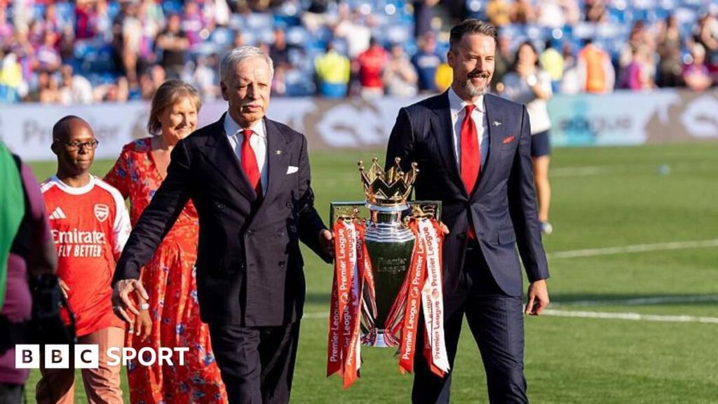 Josh Kroenke interview: ‘Covid era gave Arteta space to revive sleeping giant Arsenal’ Josh and Stan Kroenke walk trophy out onto pitch