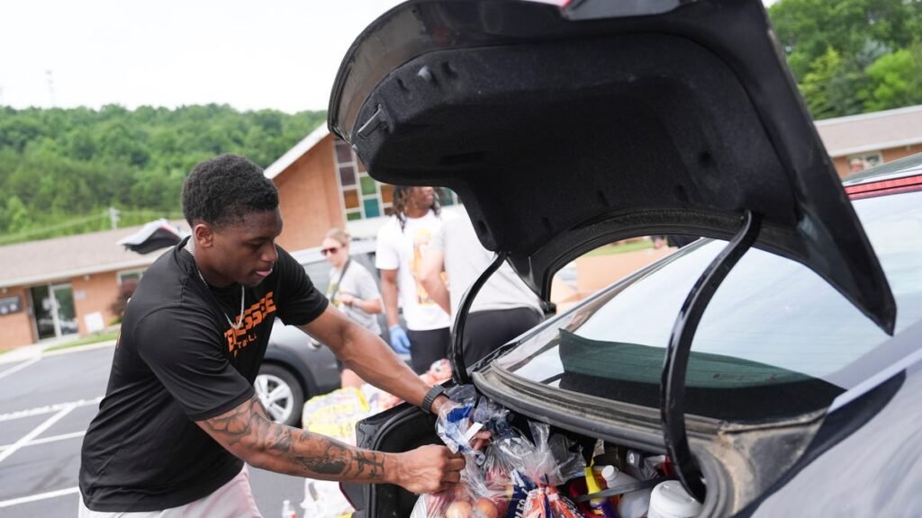 Tennessee football service day at Second Harvest, Dolly Parton hospital Tennessee football service day at Second Harvest, Dolly Parton hospital