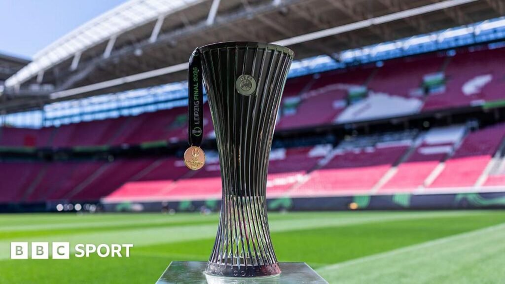 Two arrested as Crystal Palace and Rayo Vallecano fans clash A picture of the Europa League trophy