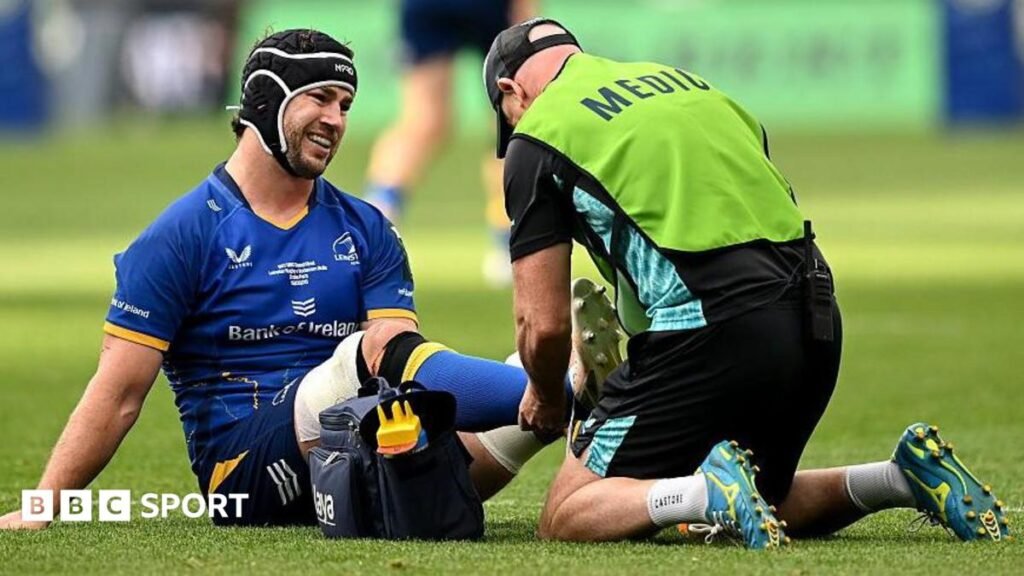 Caelan Doris receives treatment on the pitch