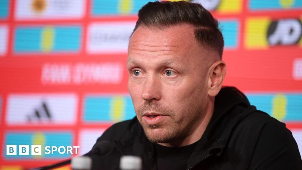 Craig Bellamy: Wales boss rejects club offers to commit to Euro 2028 Craig Bellamy speaks at a news conference