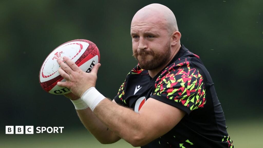 Dillon Lewis: Wales turn to Dragons prop in problem position Dillon Lewis with the ball in training for Wales ahead of the Barbarians game