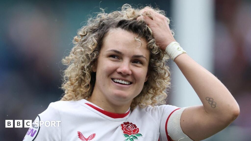 Ellie Kildunne: England full-back joins Bristol for 2026-27 PWR season Ellie Kildunne walking on the pitch during a Six Nations match for England with her left hand held on her head in her hair
