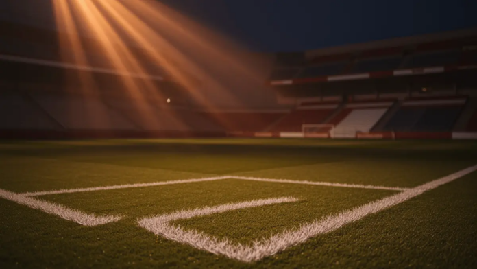 England vs Croatia World Cup 2026 Predictions and Best Bets Empty stadium corner with dramatic evening floodlighting, white pitch markings, and red-white colour accents in stands.