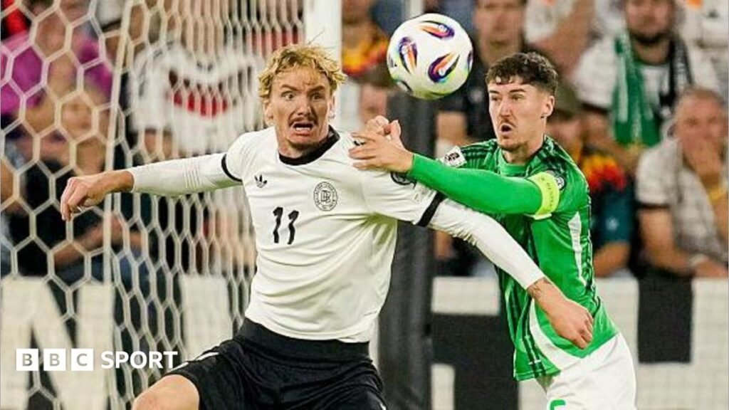 Euro 2028: BBC extends rights deal for NI internationals until 2028 Nick Woltemade and Trai Hume keep their eyes on the ball