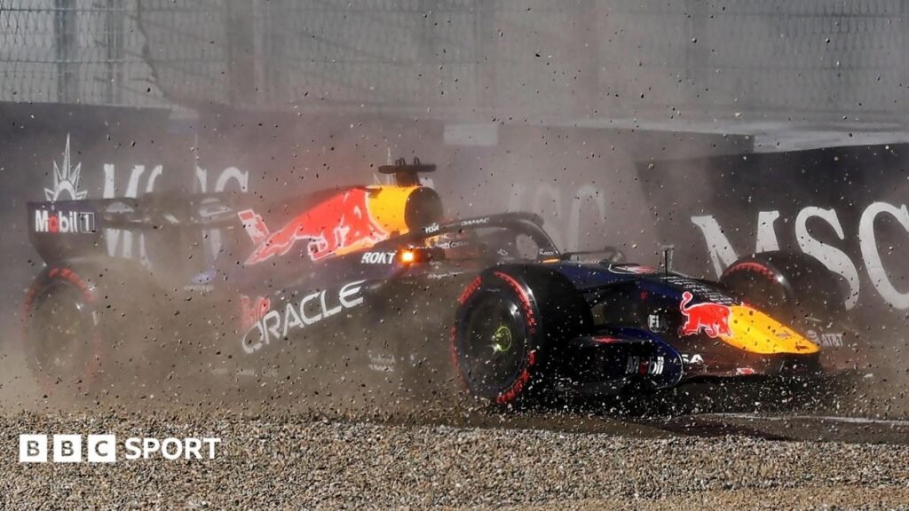 Red Bull's Max Verstappen throws up gravel as it crashes into the barrier during qualifying for the Austrian Grand Prix