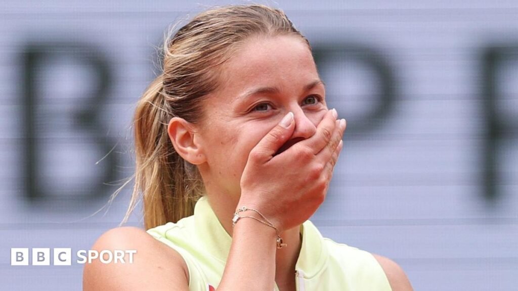 Polish qualifier Maja Chwalinska covers her mouth with her hand after completing victory over Anna Kalinskaya