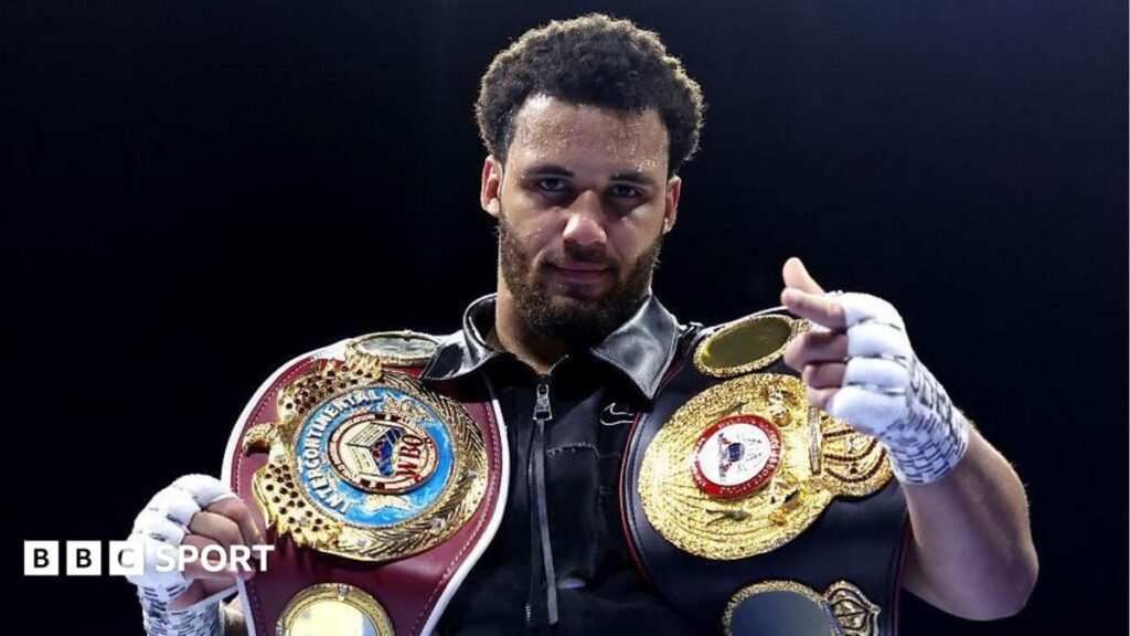 Moses Itauma poses with his title belts after beating Jermaine Franklin Jr in March 2026