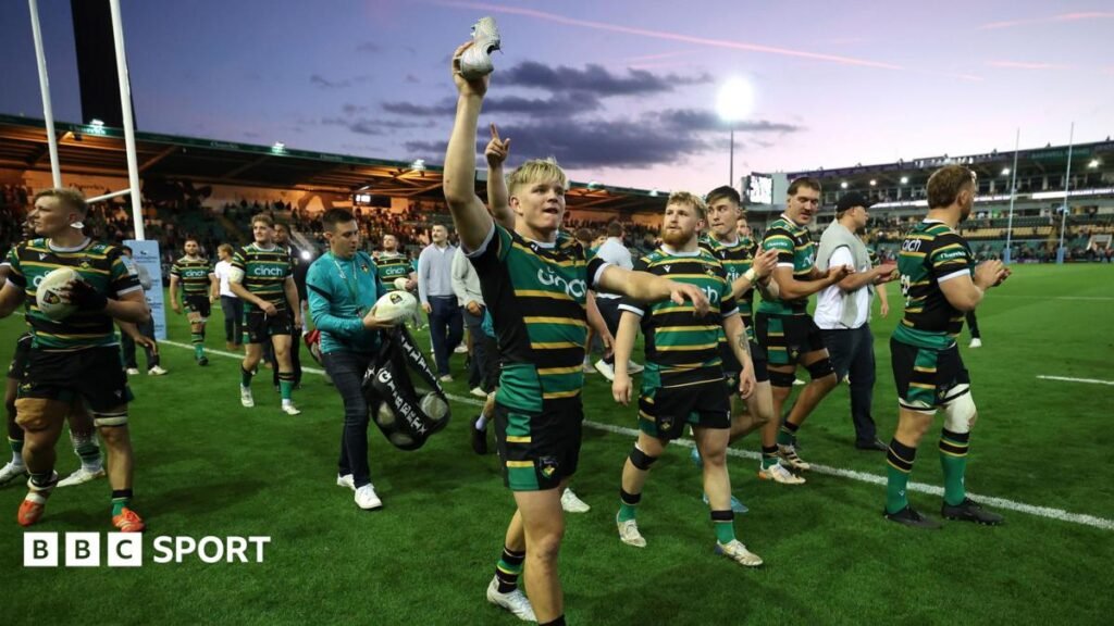 Northampton Saints: From 2024 Prem winners to the best yet A photo of Henry Pollock holding up his shoe while walking around the pitch at Franklin's Gardens with his team-mates after winning Leicester Tigers in the Prem semi-final on Friday