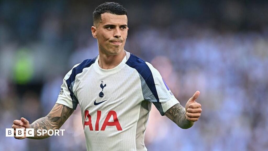 Pedro Porro signs new long-term Tottenham Hotspur contract Pedro Porro, wearing a white Tottenham shirt, gives a thumbs up