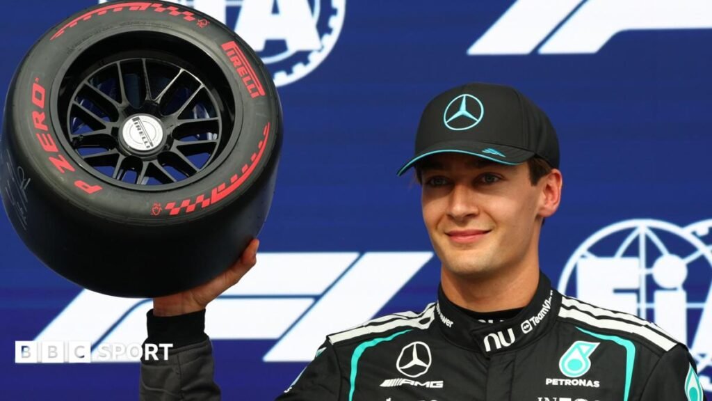 Mercedes driver George Russell holds aloft the Pirelli pole position at the 2026 Canadian Grand Prix
