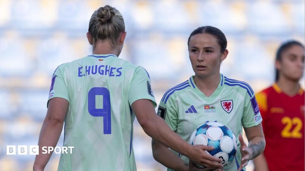 Elise Hughes and Hannah Cain during Wales' draw in Montenegro