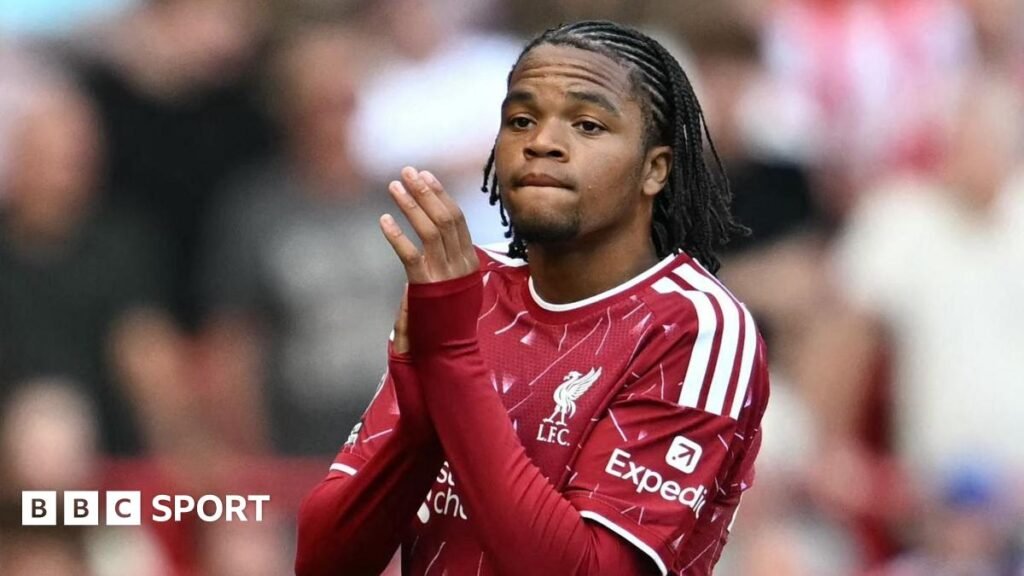 Liverpool's 17-year-old winger Rio Ngumoha clapping