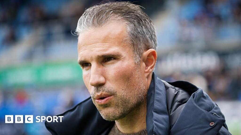 Robin Van Persie sacked by Feyenoord after just 16 months in charge Close up of Robin van Persie wearing a thick coat