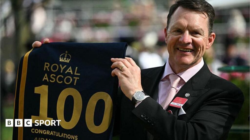 Trainer Aidan O'Brien poses after training his 100th winning horse