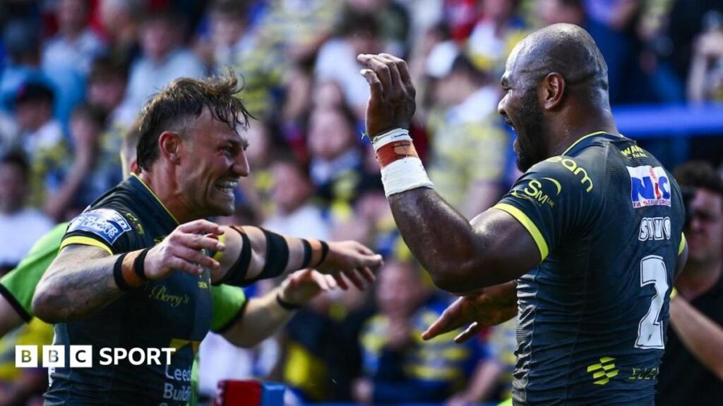 Super League: Warrington Wolves 6-34 Leeds Rhinos – Sivo scores hat-trick for visitors Maika Sivo celebrates a try with Leeds team-mate Chris Hankinson