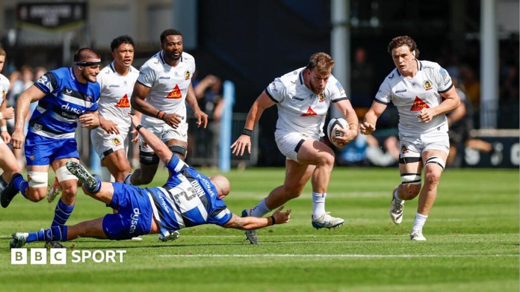 Ethan Burger (right) skips past Tom Dunn's tackle on the floor