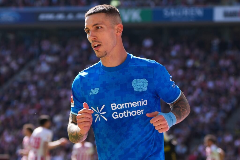 What Xabi Alonso told Bayer Leverkusen scouts to target Grimaldo playing for Bayer Leverkusen.