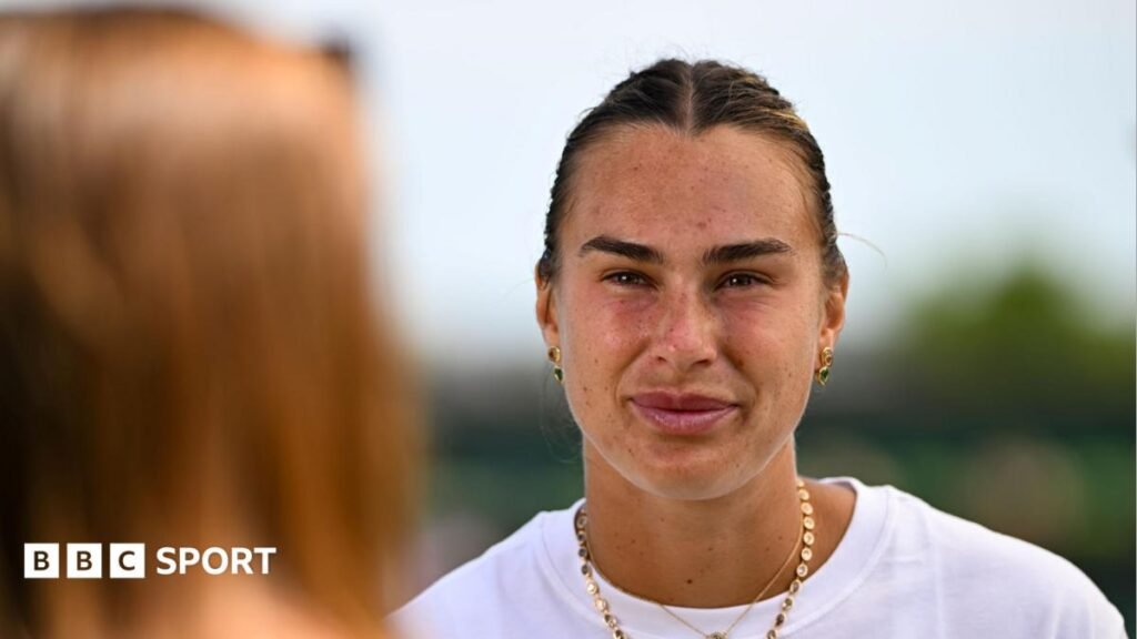 Aryna Sabalenka talks to the media