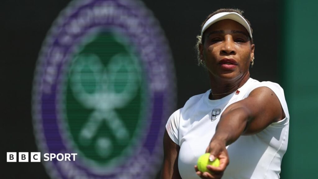 Serena Williams prepares to toss a tennis ball in practice at Wimbledon