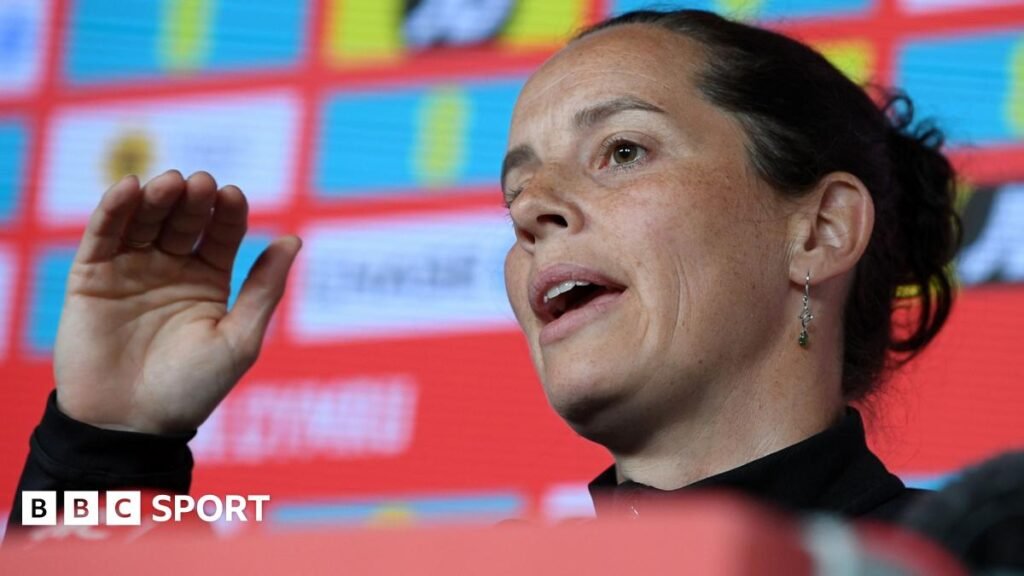 Rhian Wilkinson makes a point at a press conference