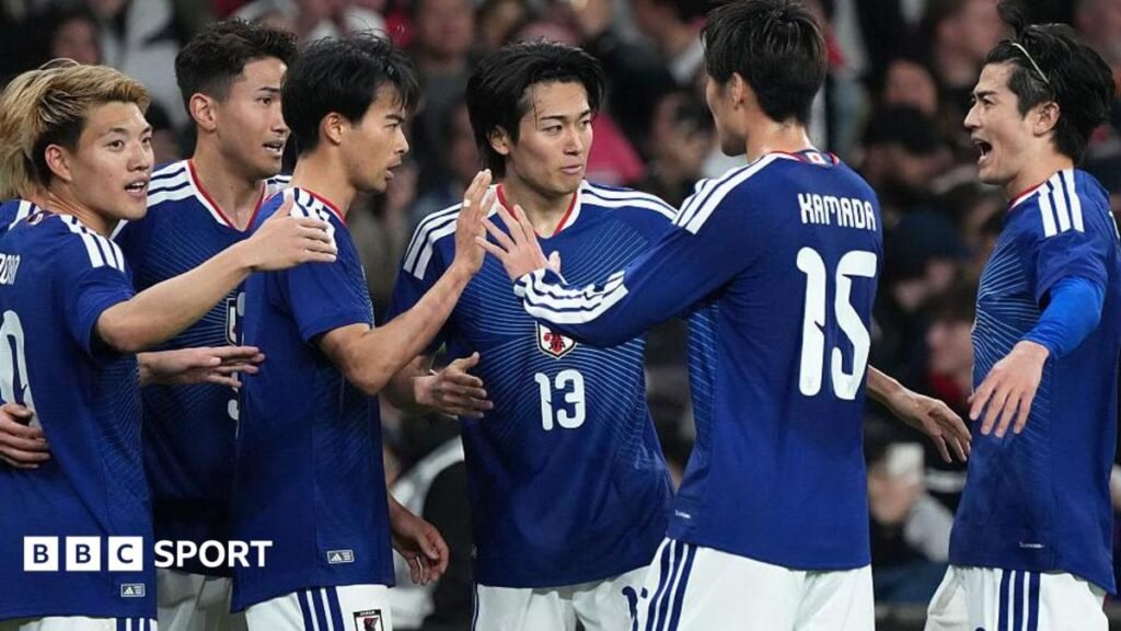 Japan players celebrate against England