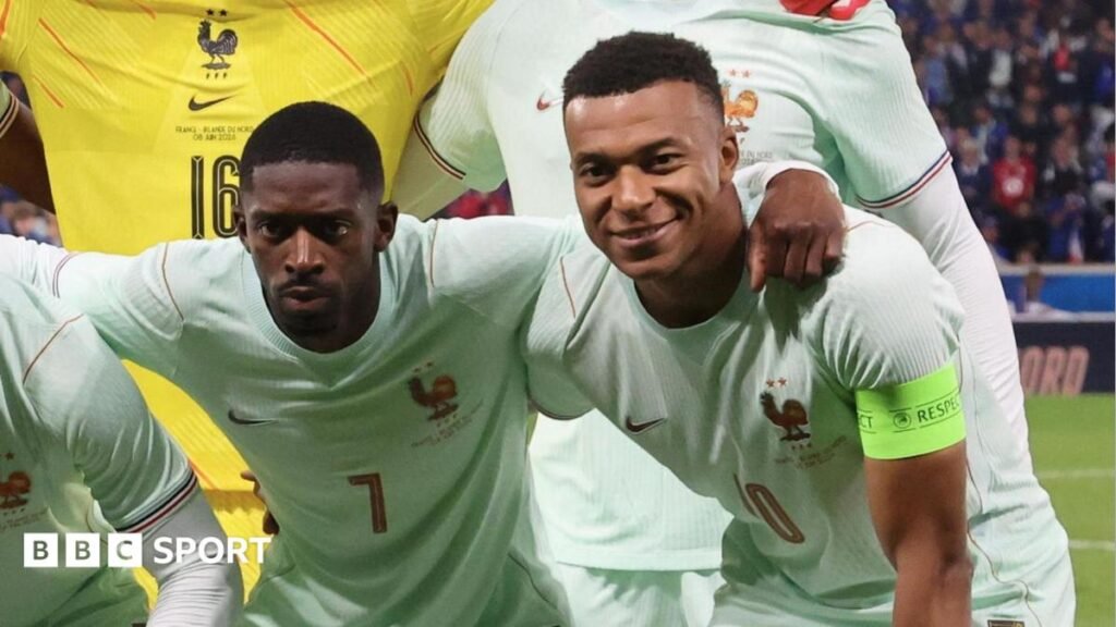 World Cup 2026: Critics of France captain Kylian Mbappe have gone ‘too far’, says Ousmane Dembele Ousmane Dembele and Kylian Mbappe pose in a pre-match team photo