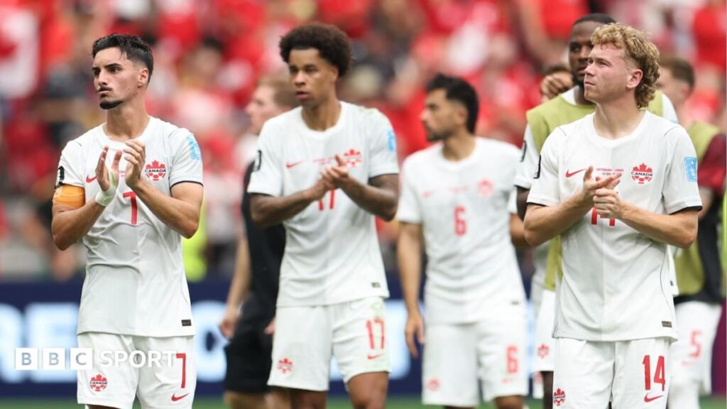 A picture of the World Cup predictor, with text alongside reading "Predict the World Cup"