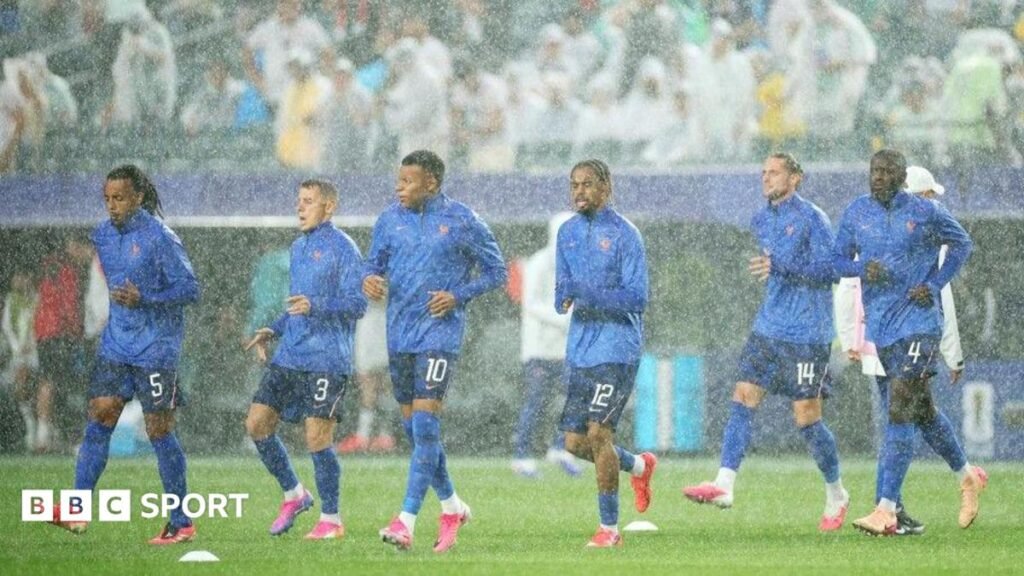 World Cup 2026: What France & Iraq did during two-hour weather delay France players warm-up in heavy rain in Philadelphia at the World Cup match against Iraq