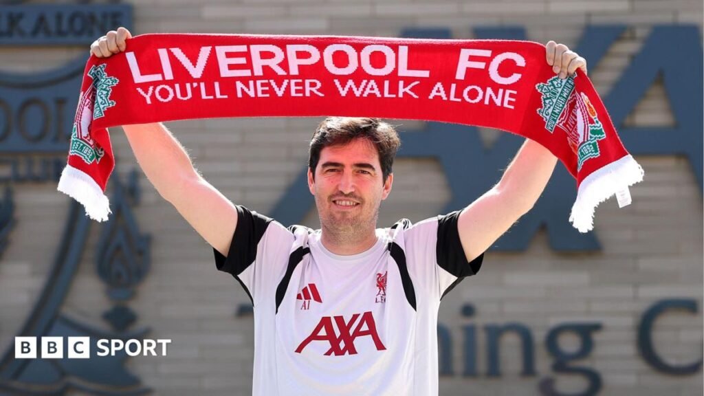 Andoni Iraola: Liverpool boss wants to give fans ‘team to be proud of’ Andoni Iraola holds a liverpool scarf above his head