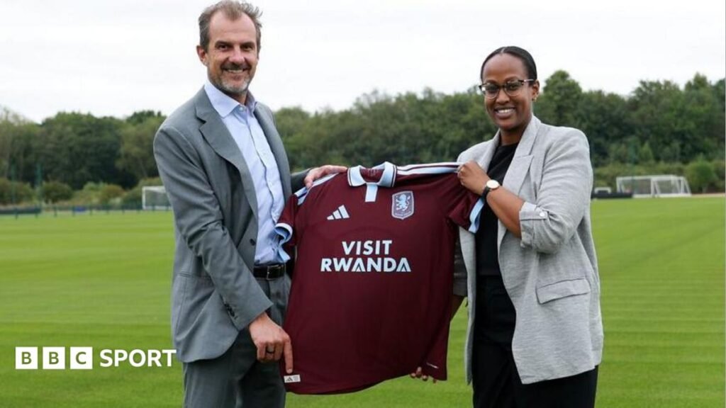 Aston Villa warned over sportswashing after signing Visit Rwanda sponsorship Aston Villa president of business Francesco Calvo and Janet Karemera, CEO of the Rwanda Convention Bureau, hold up an Aston Villa shirt with Visit Rwanda as sponsor