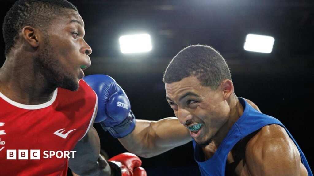 Commonwealth Games: A bolt from the blue as Welsh boxers go for gold Orlando Holley-Sotomi lands a punch on opponent Refiloe Thai.