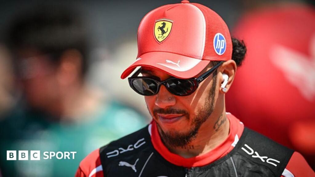Ferrari's Lewis Hamilton driving down the pit lane during the Hungarian Grand Prix
