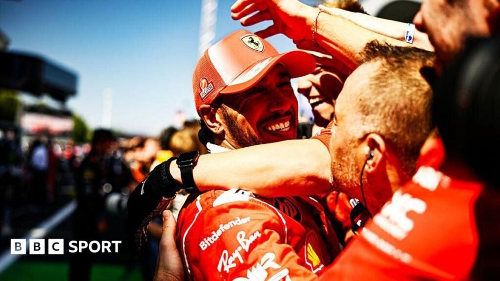 Lewis Hamilton celebrating with the Ferrari team