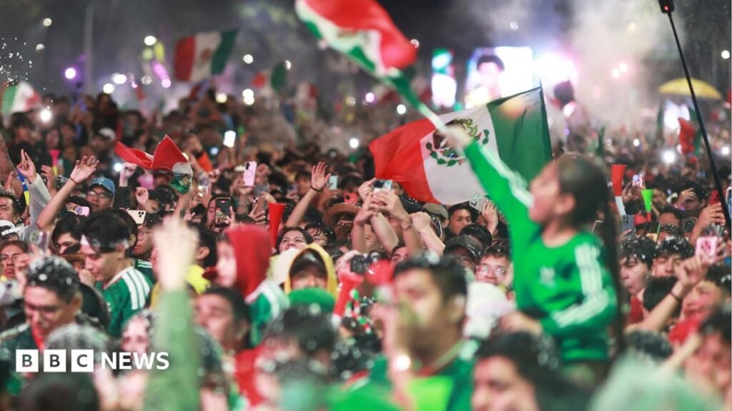 Four die in Mexico City World Cup celebrations A woman with shoulder-length blonde hair talks into a microphone