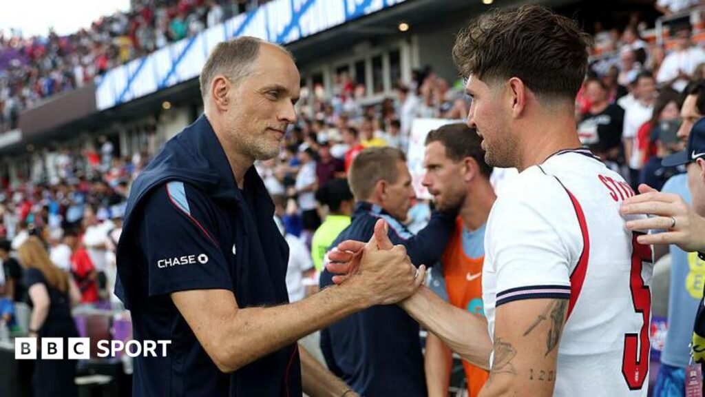John Stones jokes shoulder fine after prank on England boss Thomas Tuchel Thomas Tuchel shakes hands with John Stones