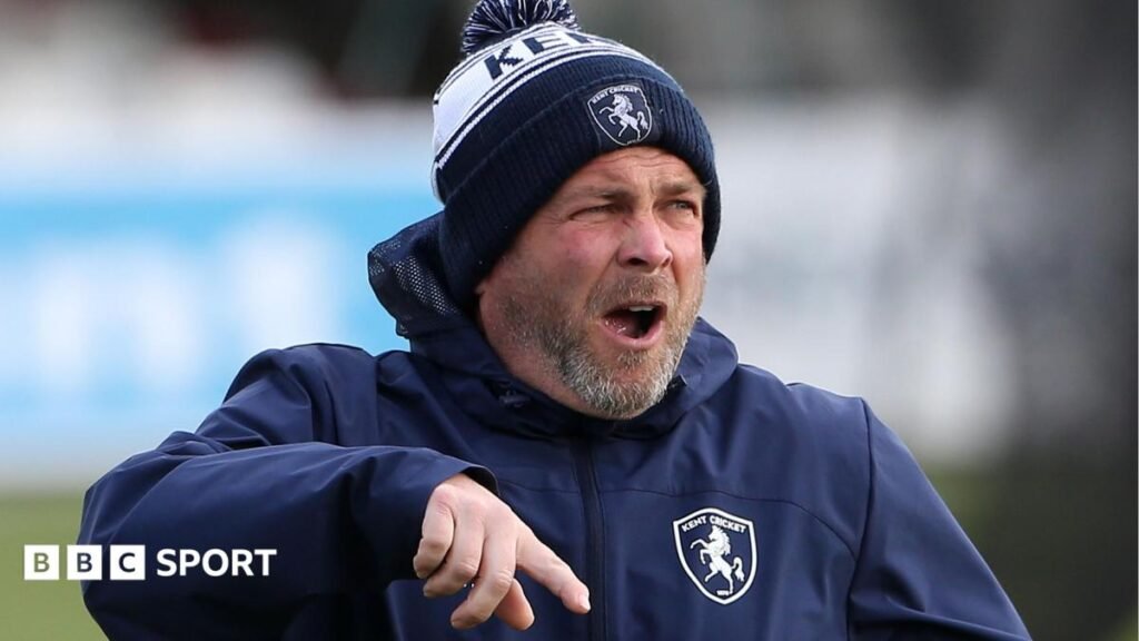Matt Walker: Sussex appoint new head coach to succeed Paul Farbrace Matt Walker shouting and pointing instructions, wearing a blue and white Kent CC beanie hat and blue padded training jacket