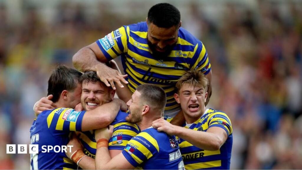 Super League: Warrington 34-6 Hull KR – Wire brush aside reigning champions Joe Philbin is mobbed by Warrington Wolves team-mates after scoring a try against Hull KR.