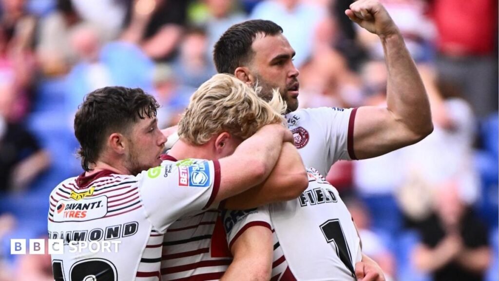 Super League: Wigan 16-14 St Helens – Warriors edge classic derby at Magic Weekend Jai Field is engulfed by Wigan Warriors team-mates after scoring against St Helens