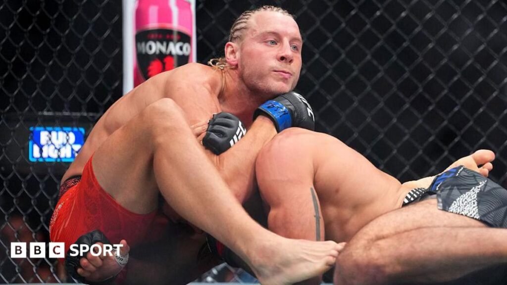 UFC 329: Paddy Pimblett makes title claim with 52-second win Paddy Pimblett submits Benoit Saint-Denis with a guillotine choke