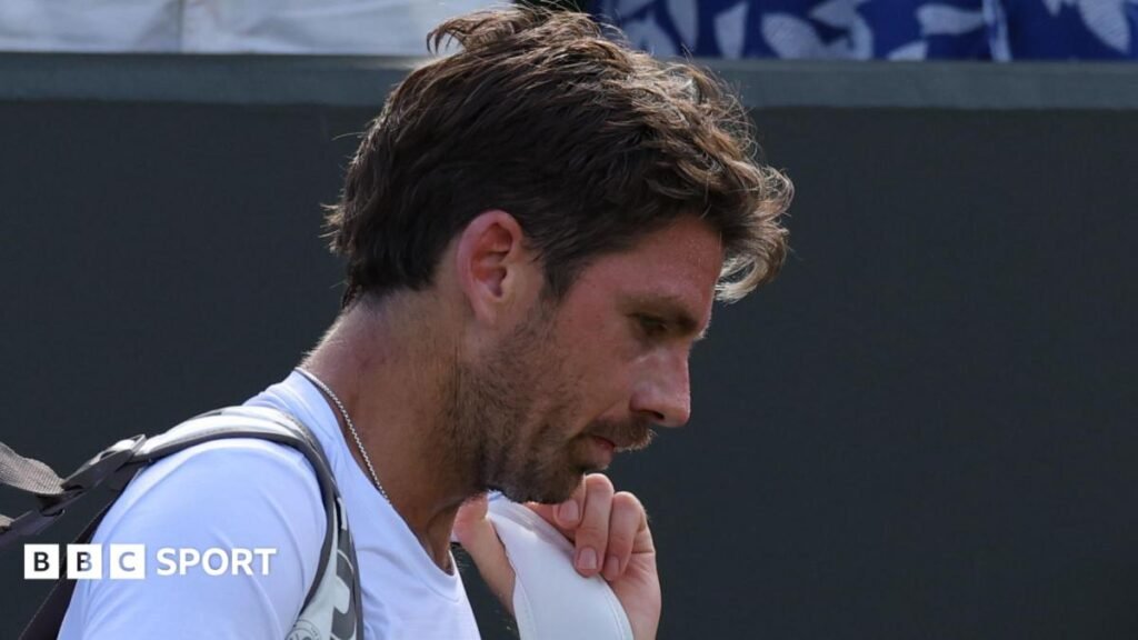 Cameron Norrie trudges off court at Wimbledon