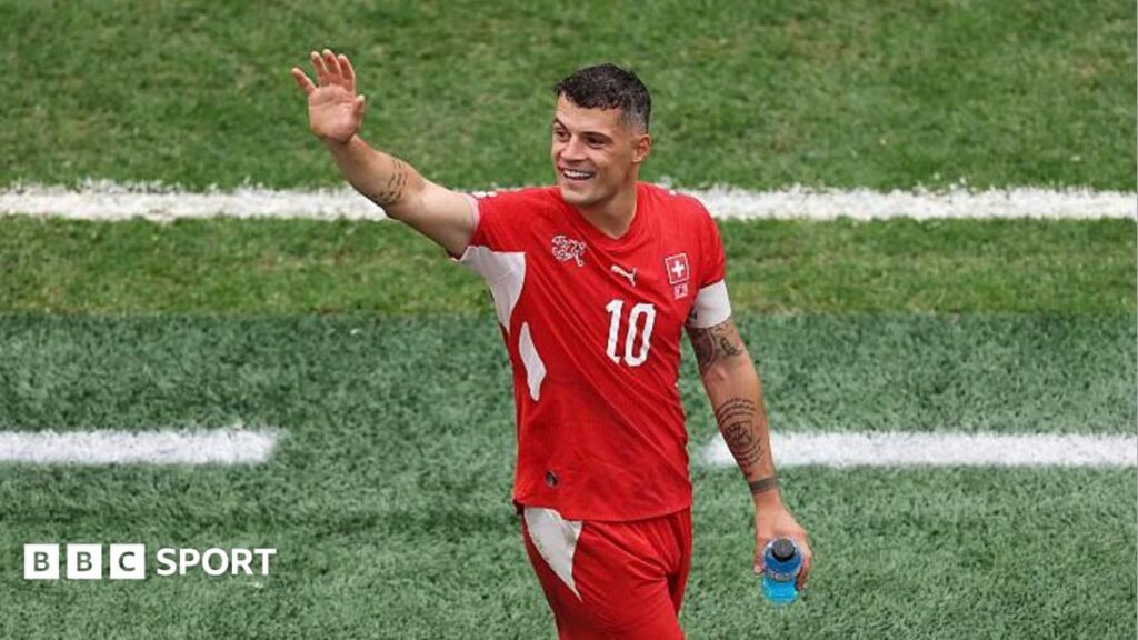 World Cup 2026: A new chapter in Granit Xhaka’s resurgence as Switzerland chase history Granit Xhaka waves to the crowd