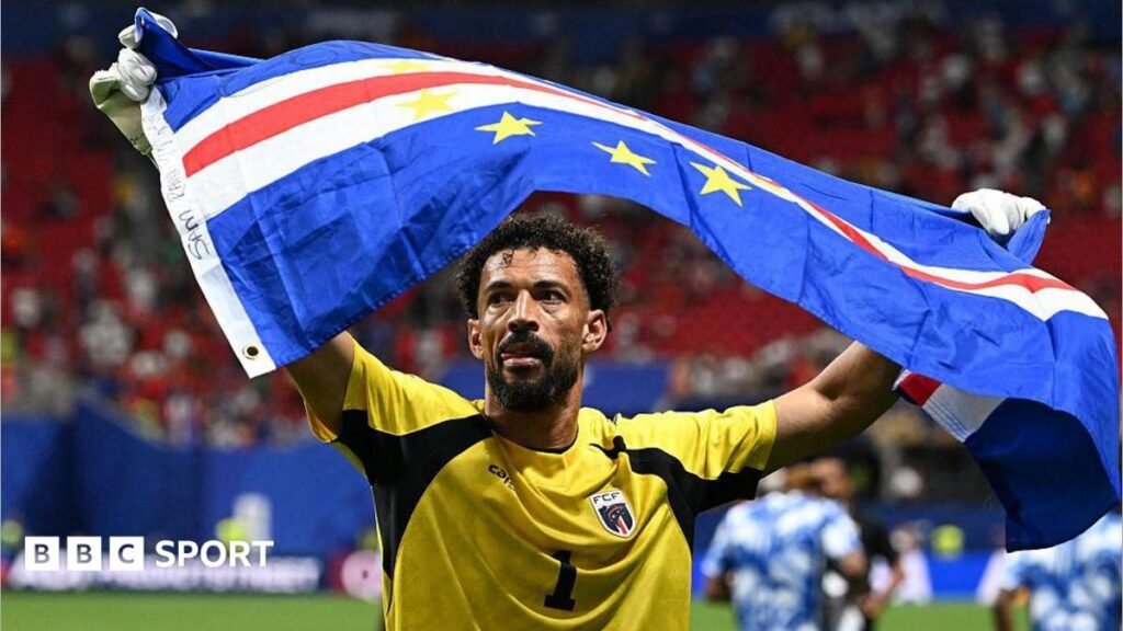 World Cup 2026: Cape Verde say goodbye after defeat by Argentina Vozinha holding Cape Verde flag