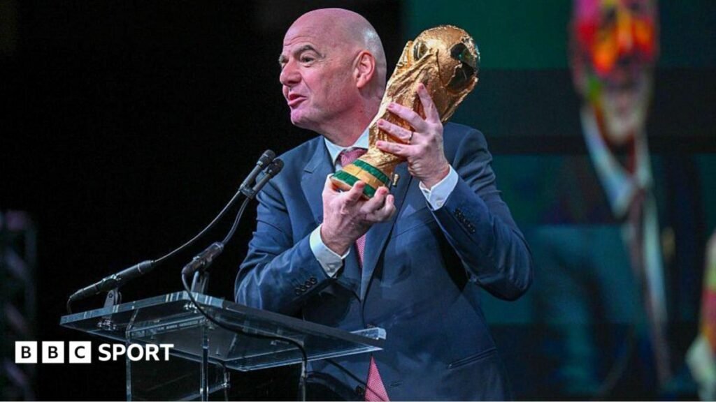 World Cup 2026: Could Gianni Infantino push through a 64-team tournament? FIFA president Gianni Infantino holds the FIFA World Cup trophy