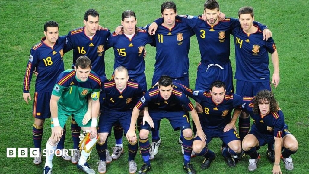 Sergio Ramos, Carles Puyol and Gerard Pique celebrate