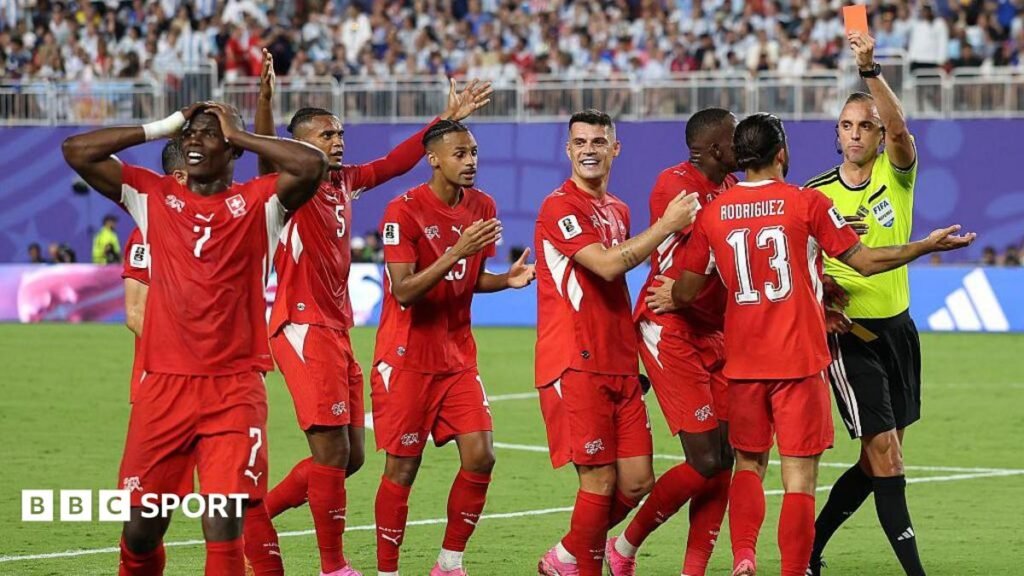 World Cup 2026: VAR will not be used for diving in Uefa competitions Referee Joao Pinheiro shows a red card to Breel Embolo of Switzerland as his teammate protest the decision