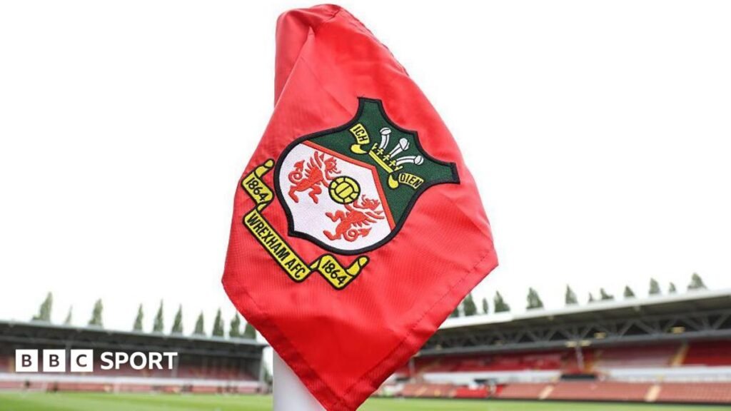 Wrexham: Red Dragons to appoint Newcastle United’s Steve Nickson as sporting director Red corner flag with Wrexham logo inside the Racecourse Ground